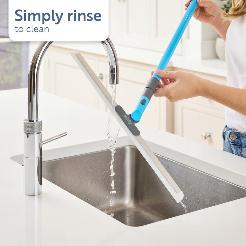 🥳2026 HOT SALE🥳💞50K+ SOLD!🐾🧼 LAST DAY 50% OFF! Multi‑Surface Silicone Squeegee – Removes pet hair, sand & spills. 180° rotating head, adjustable long handle. No tangled bristles! 🧽💪
