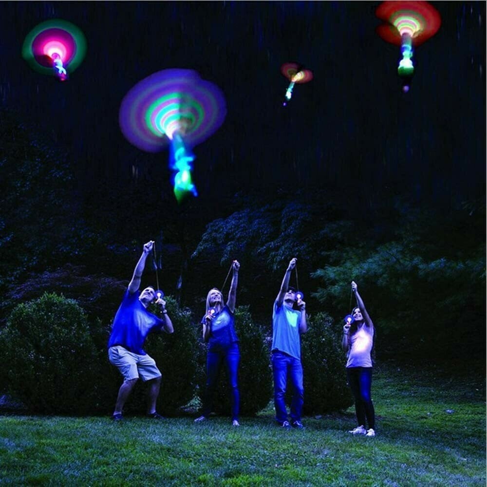 🥳2026 HOT SALE🥳💞50K+ SOLD! 🚁✨ BUY 2 GET 1 FREE! LED Helicopter Launcher – Shoots up to 120ft, lights up the night sky. Slowly descends like a parachute – lands right in your hand! From £4.99 – buy more & save! 🎮🌟