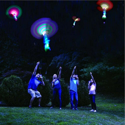 🥳2026 HOT SALE🥳💞50K+ SOLD! 🚁✨ BUY 2 GET 1 FREE! LED Helicopter Launcher – Shoots up to 120ft, lights up the night sky. Slowly descends like a parachute – lands right in your hand! From £4.99 – buy more & save! 🎮🌟