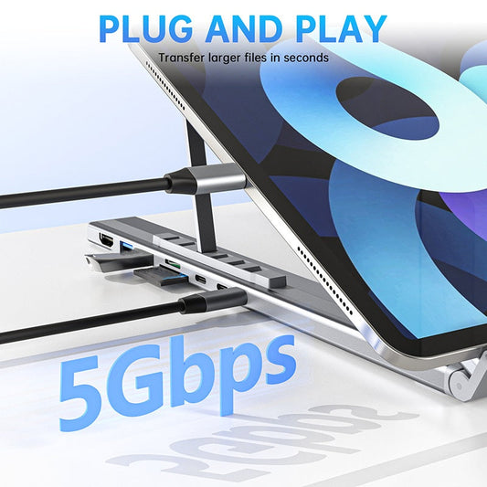 🥳2026 HOT SALE🥳💞50K+ SOLD!💥🏠⚡ 50% OFF! Laptop Stand with 8‑Port Hub – 4K HDMI, USB 3.0, card reader. Ergonomic lift, supports up to 44lbs. Work or stream in comfort. 🛋️💻