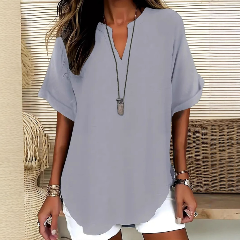 🥳2026 HOT SALE🥳💞50K+ SOLD!👕🌸  50% OFF! Fashion Loose Short Sleeve Top – Flattering V-notch, modern hem. Soft & airy for warm days. Effortless style in 5 colours. 👗🕊️