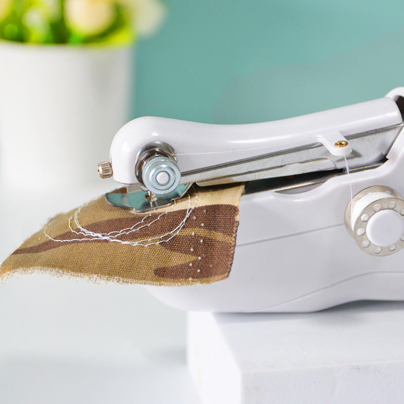 🥳2026 HOT SALE🥳💞50K+ SOLD!🧵✂️ 50% OFF! Mini Electric Sewing Machine – Lightweight, portable & beginner‑friendly. 3 speeds, complete kit. Quick fixes & DIY fun! 🏠✨