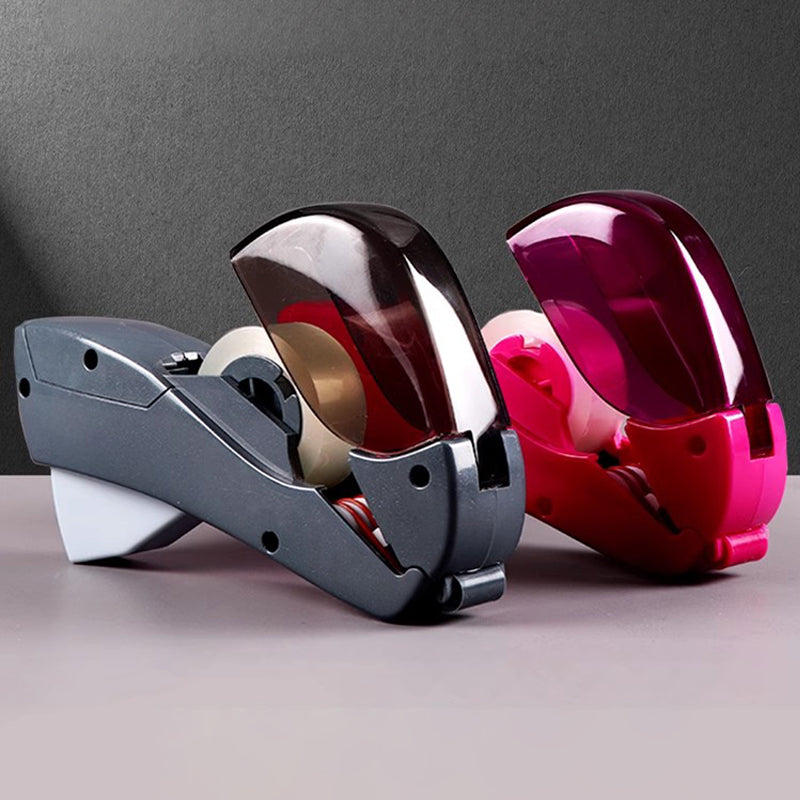 🥳2026 HOT SALE🥳💞50K+ SOLD! 📦✂️ 50% OFF! Portable Tape Cutter – one-hand operation, hidden blade for safety, no batteries. Fits 12/19mm tape. Easy gift wrapping & sealing! 🛡️✅