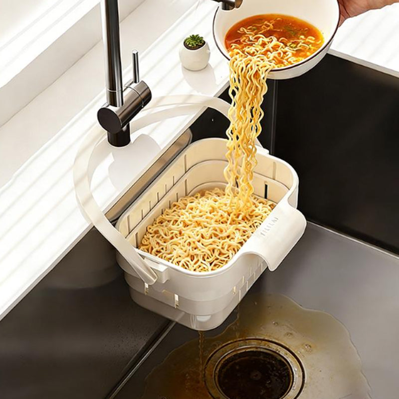 🥳2026 HOT SALE🥳💞50K+ SOLD!🍅🚰 50% OFF! Collapsible Faucet Sink Strainer – Flip‑open bottom, empty scraps hands‑free. Folds flat, hangs on tap. Kitchen cleanup made simple! 🧼✨