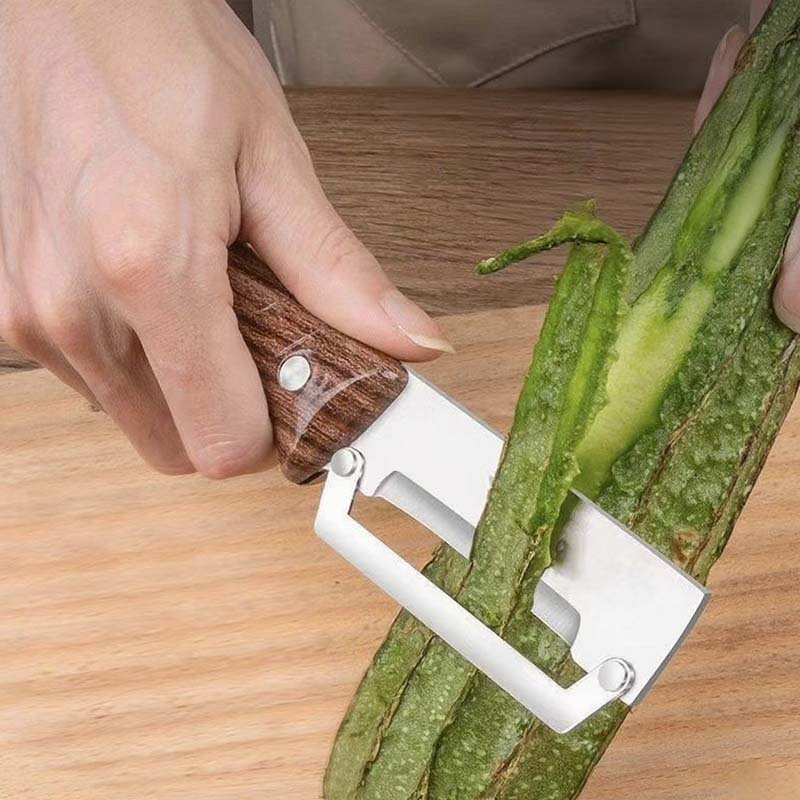 🥳2026 HOT SALE🥳💞50K+ SOLD!🪵🍾 50% OFF! Kitchen Peeler with Wooden Handle – Sharp stainless steel, minimal fruit waste. Doubles as a bottle opener. Easy on hands, great for seniors. 👵🛡️