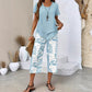 🥳2026 HOT SALE🥳💞50K+ SOLD!💕🌿 50% OFF! 2-Piece Tunic & Wide Leg Pants Set – No matching hassle, instantly chic. Layered asymmetrical top, leaf-print capri pants. Sizes S-5XL. Your new favourite. 👖✅