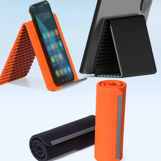🥳2026 HOT SALE🥳💞50K+ SOLD!🛋️✨ 50% OFF! Silicone Foldable Stand – Shape it your way, reduces neck pain. Ultra‑portable, anti‑slip. Work, cook or watch hands‑free. A small stand, big relief.📱🛡️