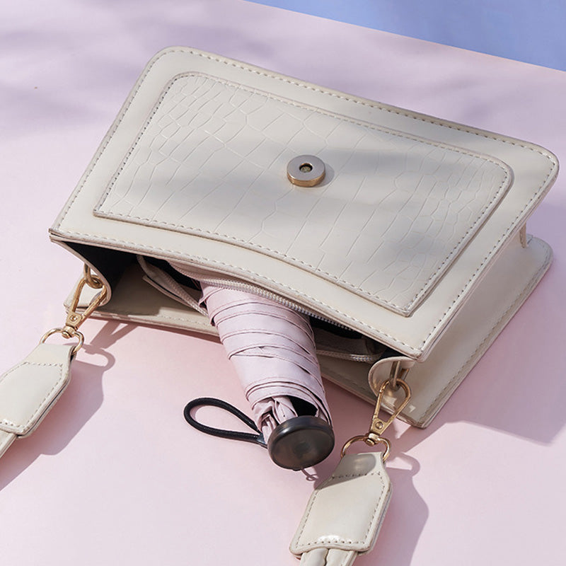 🥳2026 HOT SALE🥳💞50K+ SOLD!☂️☀️ 50% OFF! Ultra‑Light Compact Umbrella – 103g, UPF 50+, blocks 99.9% UV. Fits pocket, rain & shine. Your tiny shade! 🌂✨