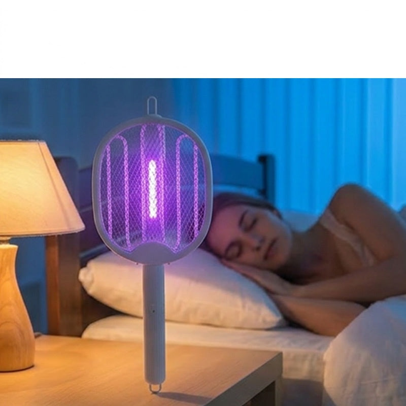 🥳2026 HOT SALE🥳💞50K+ SOLD!🦟⚡ 50% OFF! 2‑in‑1 Foldable Mosquito Swatter – Manual zap + UV auto trap. USB rechargeable, folds flat for storage. Sleep bite‑free tonight! 🌙✨