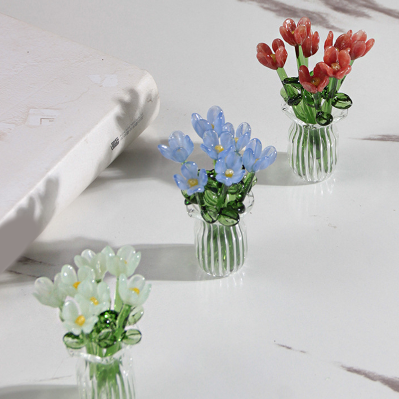 🥳2026 HOT SALE🥳💞50K+ SOLD! 🎁✨ 50% OFF! Mini Glass Bouquet – 6cm tall, 7 glass flowers + vase, never withers. Elegant gift for home & office! 🏠💚