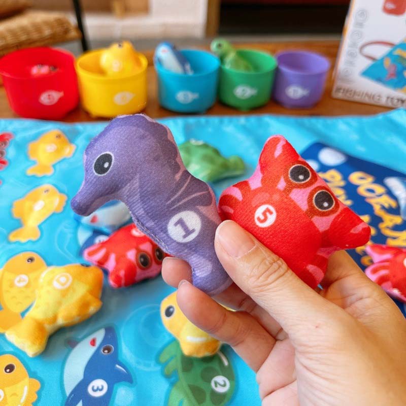 🥳2026 HOT SALE🥳💞50K+ SOLD! 🎣🧸 50% OFF! Toddler Cloth Fishing Toy Set with Stacking Cups – cloth fish, 5 stacking cups, colour & number learning. Safe, BPA-free & portable! 🛡️✅