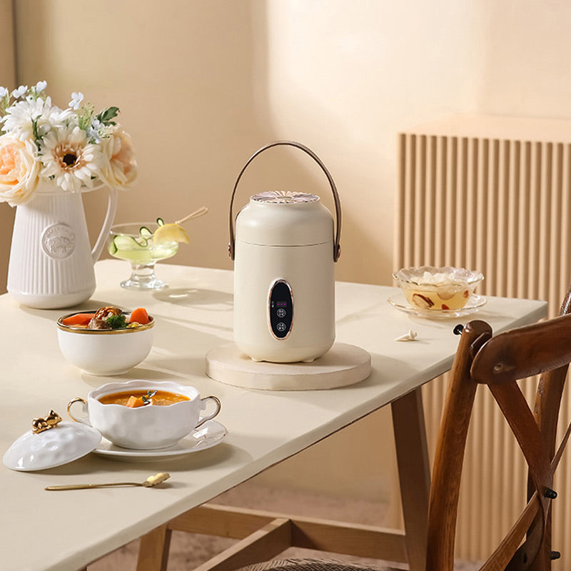 🥳2026 HOT SALE🥳💞50K+ SOLD! 🍲⏰ 50% OFF! Portable Electric Stewpot – 900ml, 9-hour reservation, 5 heat levels. Non-stick, hidden plug, anti-slip base. Cooks rice, soup & porridge – perfect for 1-2 people or travel! 🏠✅