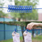 🥳2026 HOT SALE🥳💞50K+ SOLD! 🧺✨ 50% OFF! Portable Elastic Travel Clothes Rack – 12 anti-slip clips with positioning beads, steel hooks for anywhere. Lightweight 127g, perfect for travel & camping! 🛡️💪