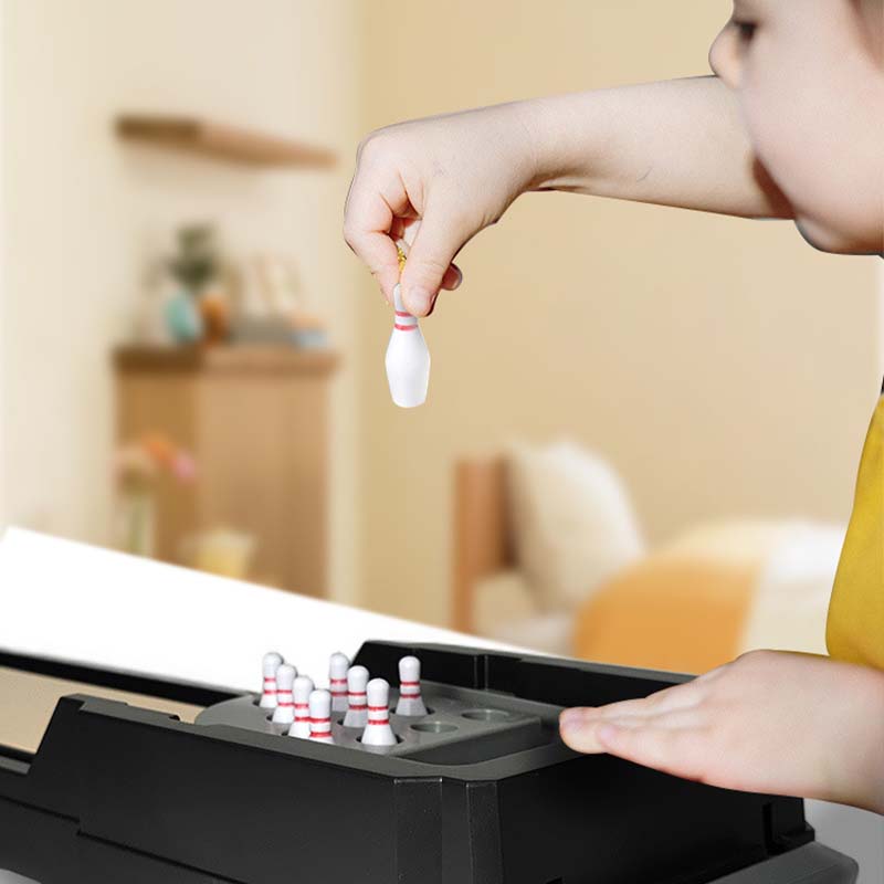 🥳2026 HOT SALE🥳💞50K+ SOLD! 🎳✨ 50% OFF! Tabletop Bowling Game – safe ABS, 12 pins & 2 metal balls. Quick-reset lever, portable fun for family & grandkids! 🛡️💪
